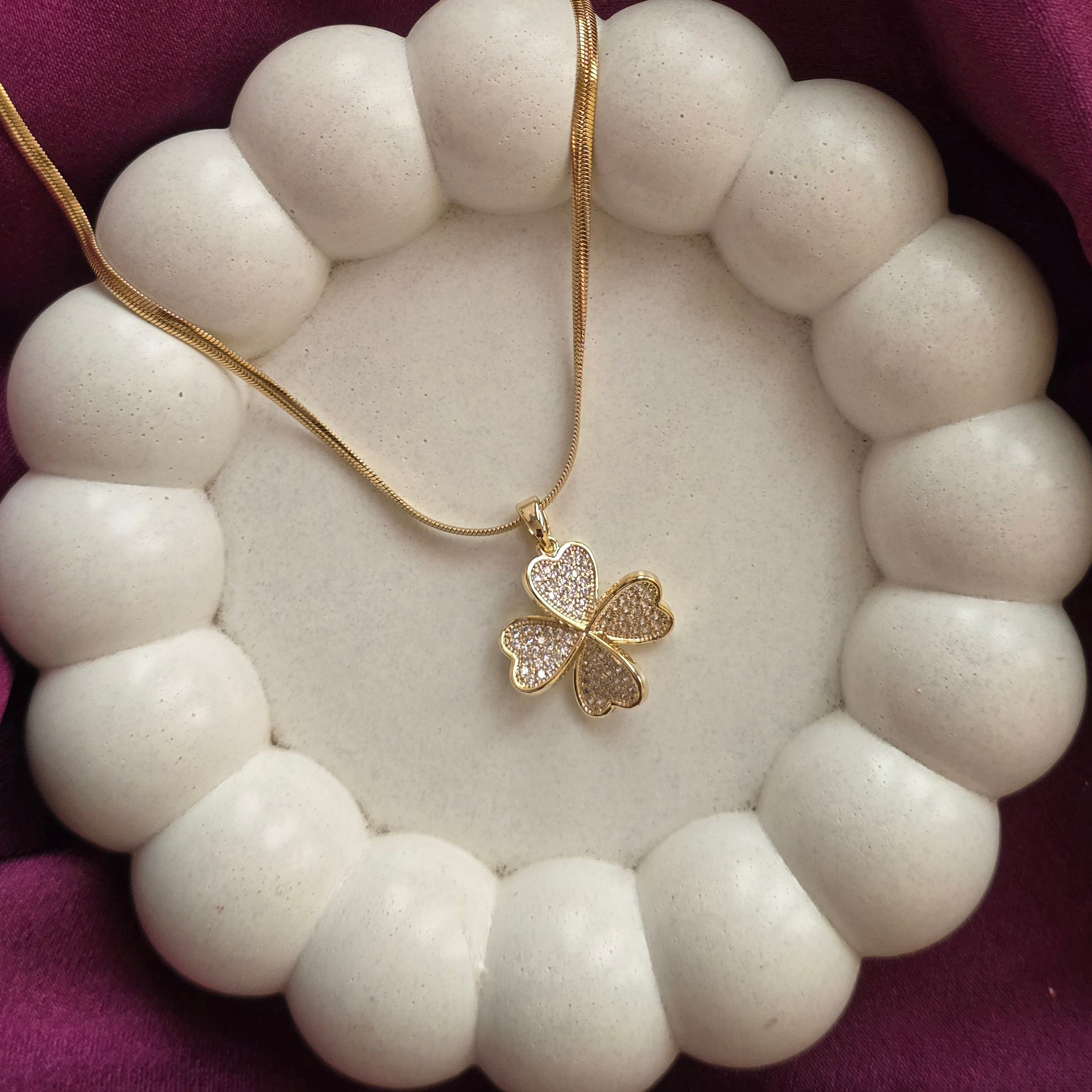 Four Petal Charm