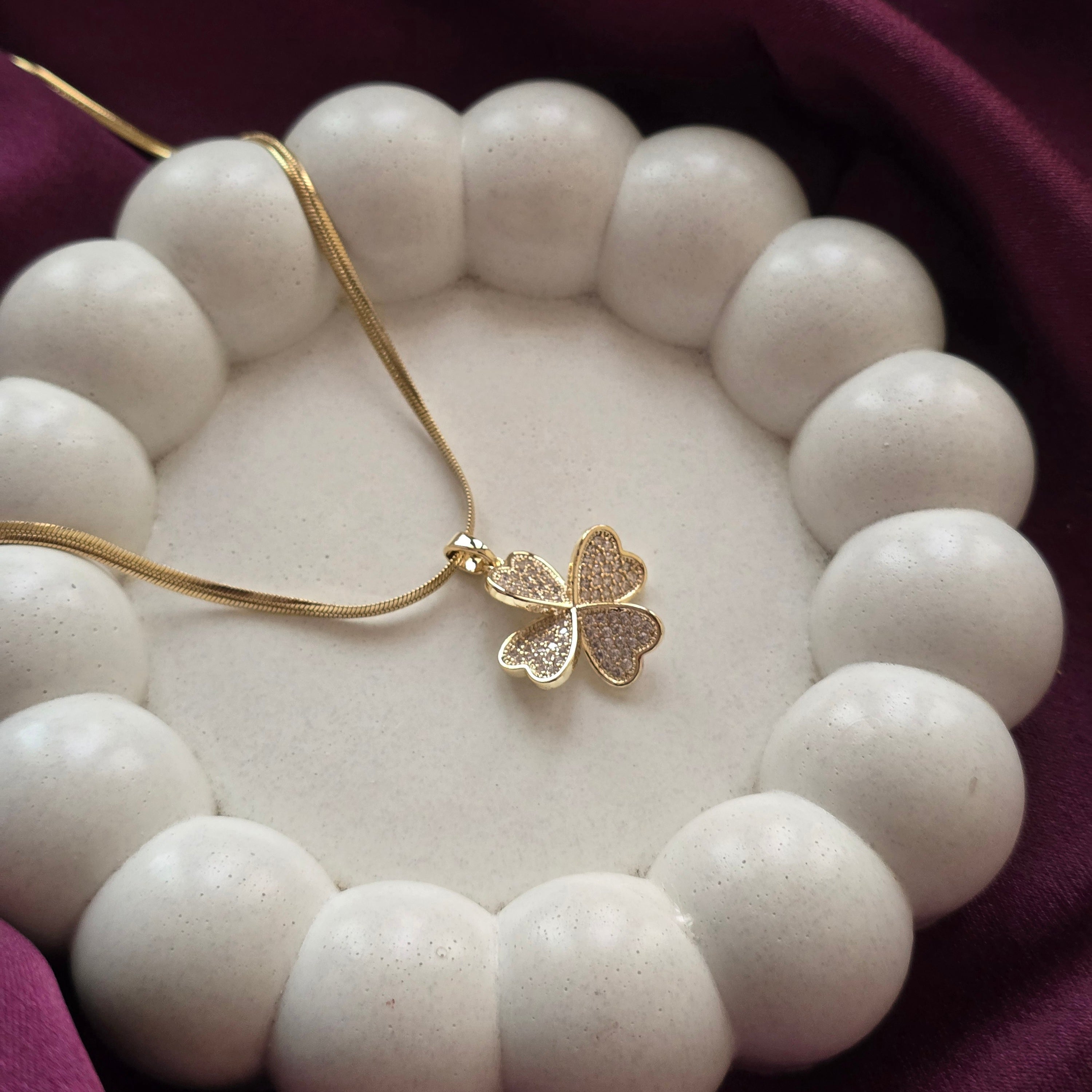 Four Petal Charm